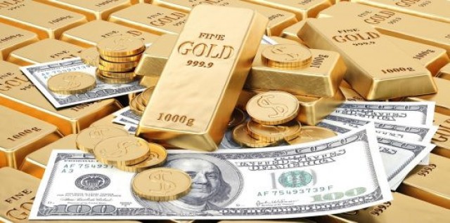 صعود الدولار يدفع الذهب للاستقرار