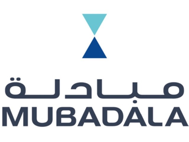 Mubadala buys stake Next