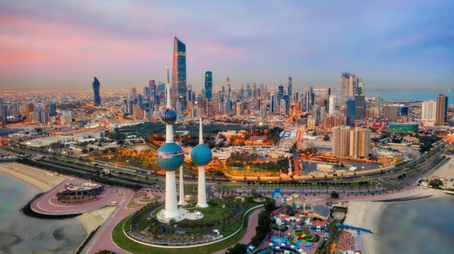 Kuwait cuts workers' salaries by 50%