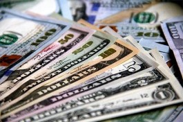 The dollar is stable as the world awaits US jobs data.