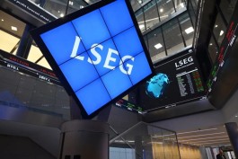 European stocks rise slightly as oil prices fall