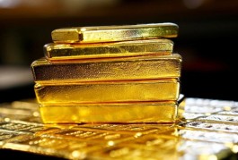Gold slides lower amid profit-taking ahead of key US data
