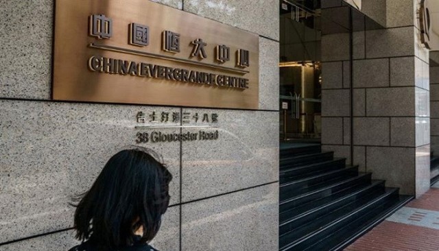 Evergrande to sell stake in troubled bank