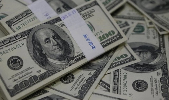 The dollar falls to its lowest level against the yuan in more than two years