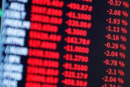 FTSE 100 index falls as tensions escalate between Washington and Tehran and oil prices rise.