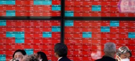 Asian stocks mixed as yen falls against dollar